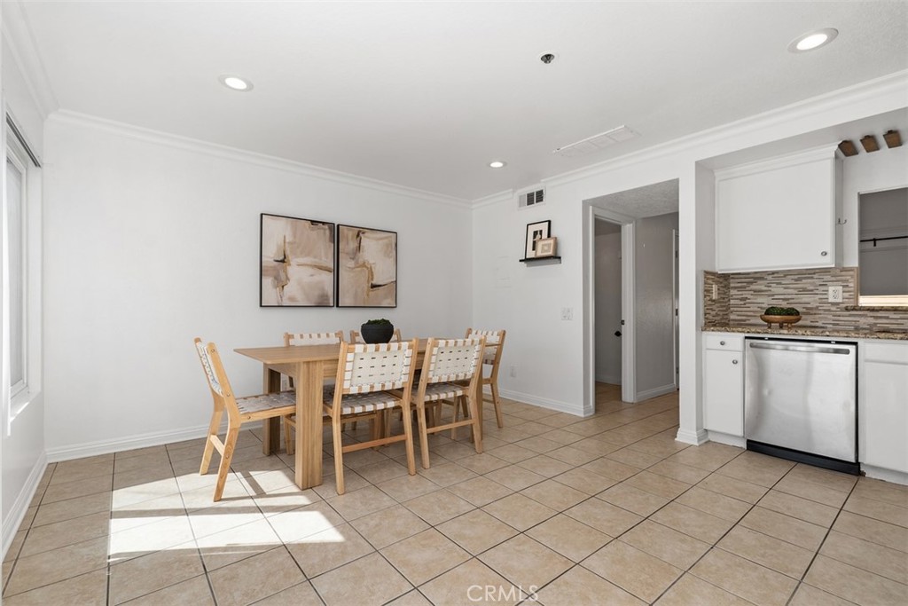 25885 Trabuco Road, Unit 203 Lake Forest, CA 92630 - Photo 13 of 43 a view of a dining room with furniture