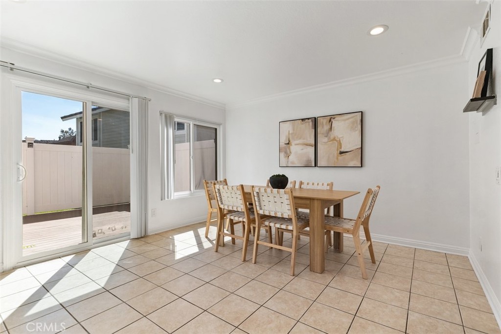 25885 Trabuco Road, Unit 203 Lake Forest, CA 92630 - Photo 14 of 43 a view of a dining room with furniture