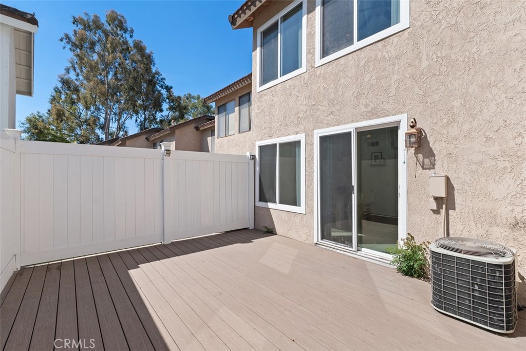25885 Trabuco Road, Unit 203 Lake Forest, CA 92630 - Photo 23 of 43 front view of a house with a yard
