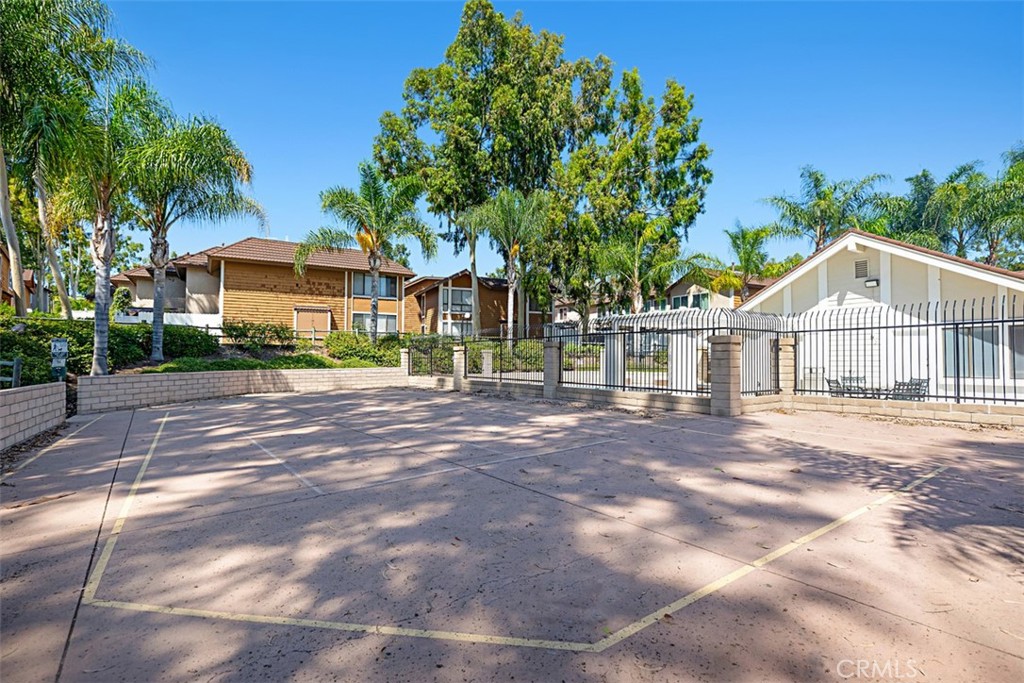 25885 Trabuco Road, Unit 203 Lake Forest, CA 92630 - Photo 25 of 43 a view of a house with a yard