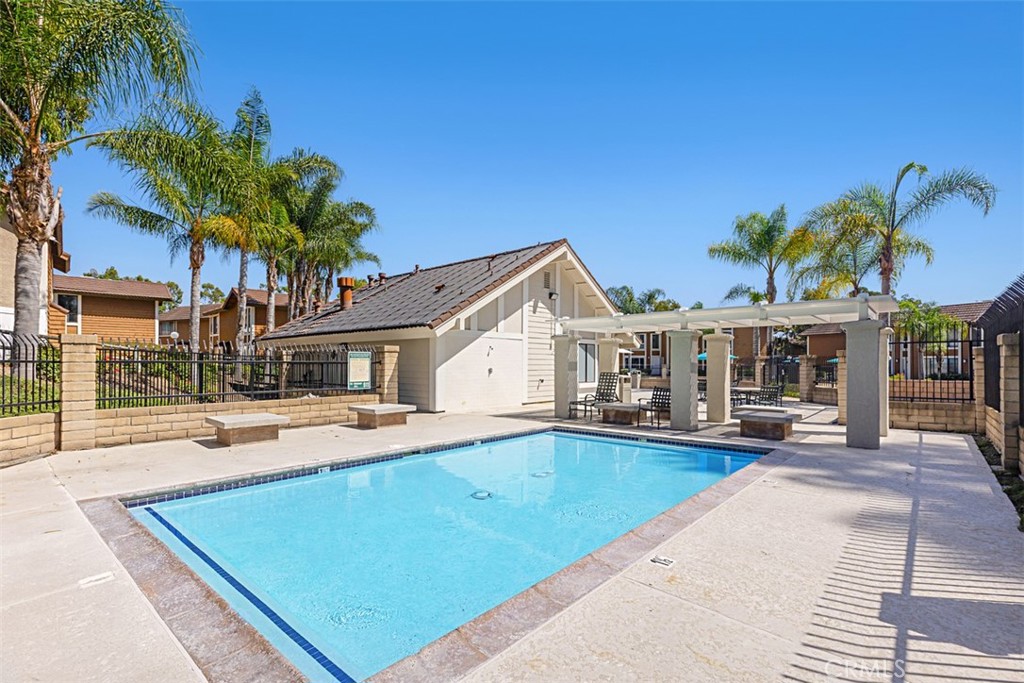 25885 Trabuco Road, Unit 203 Lake Forest, CA 92630 - Photo 27 of 43 a front view of house with yard and outdoor seating