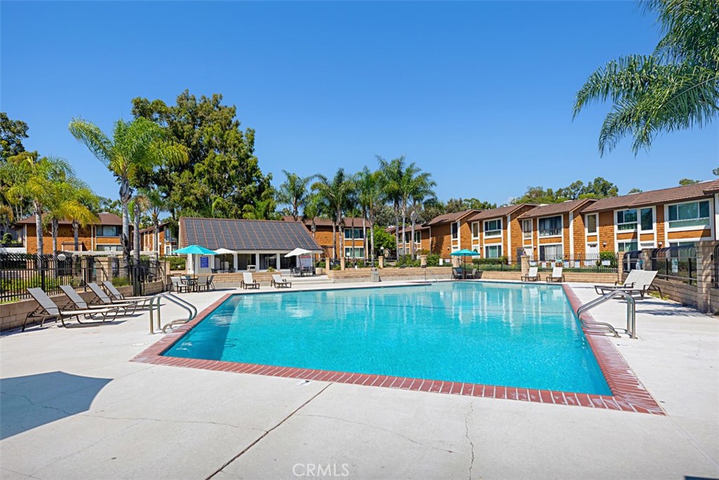 25885 Trabuco Road, Unit 203 Lake Forest, CA 92630 - Photo 31 of 43 a swimming pool view with a outdoor seating