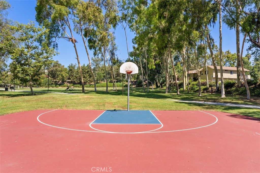 25885 Trabuco Road, Unit 203 Lake Forest, CA 92630 - Photo 34 of 43 a swimming pool with outdoor seating and yard