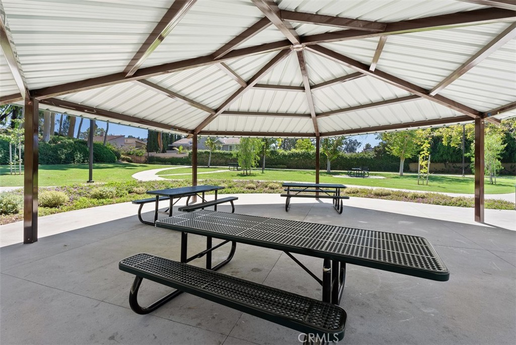 25885 Trabuco Road, Unit 203 Lake Forest, CA 92630 - Photo 37 of 43 a view of a swimming pool with a patio