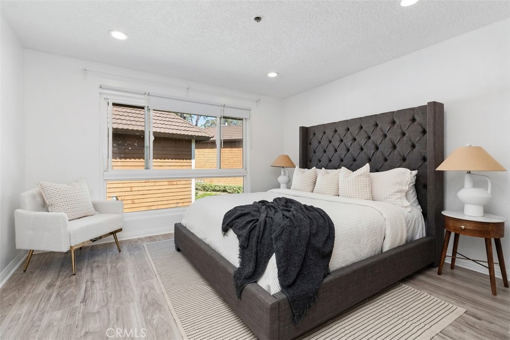 25885 Trabuco Road, Unit 203 Lake Forest, CA 92630 - Photo 4 of 43 a bedroom with bed and window