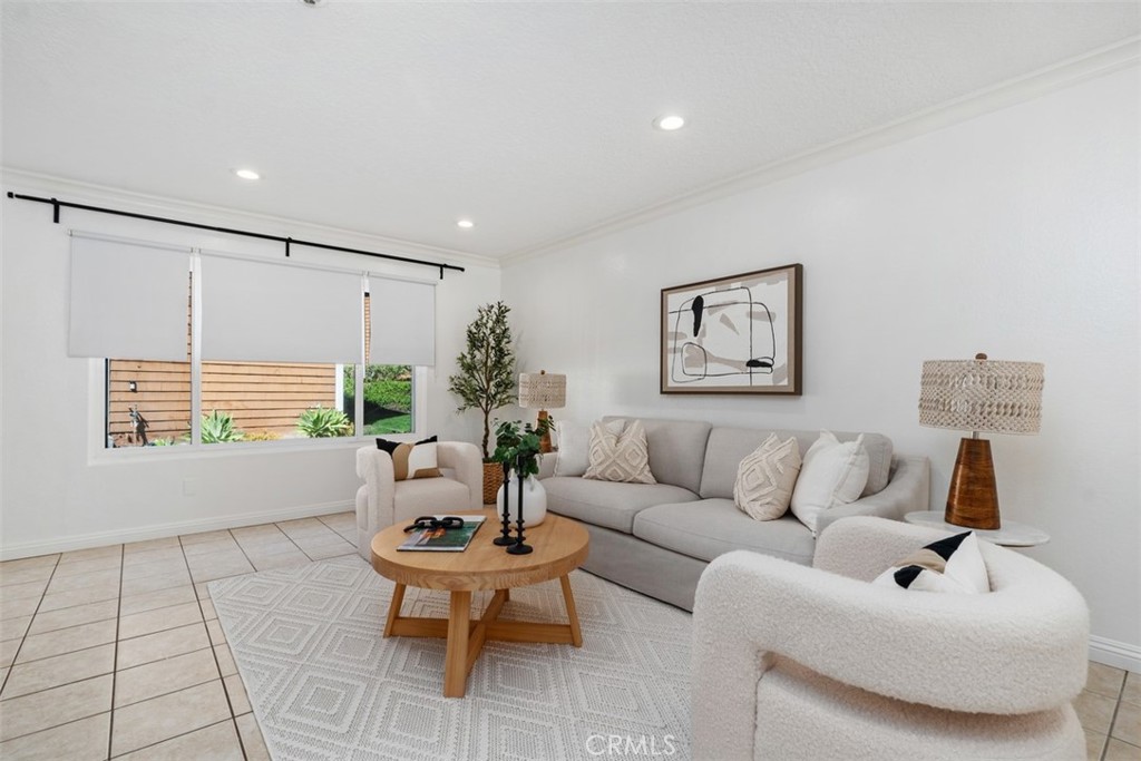 25885 Trabuco Road, Unit 203 Lake Forest, CA 92630 - Photo 8 of 43 a living room with furniture and a large window