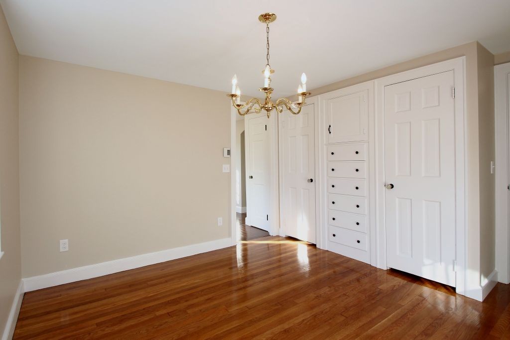 18 Parmenter Road Wayland, MA 01778 - Photo 6 of 28 wooden floor in an empty room
