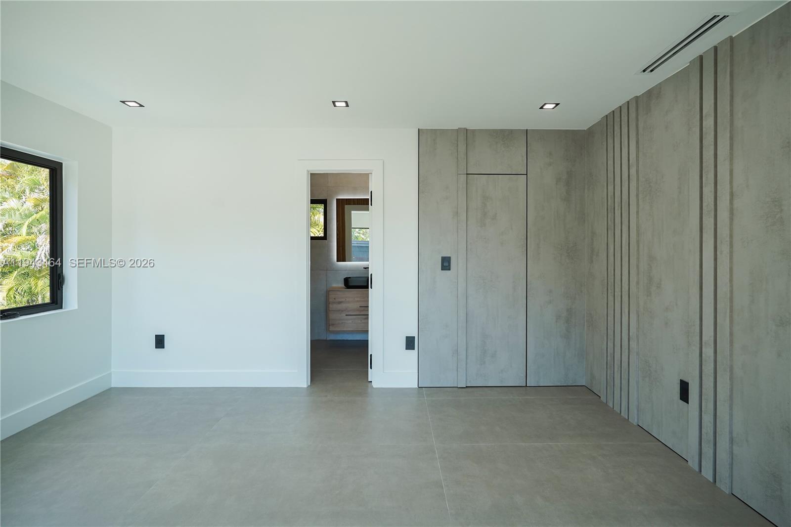 7765 Southwest 57th Terrace Miami, FL 33143 - Photo 51 of 52 a view of an empty room with a window