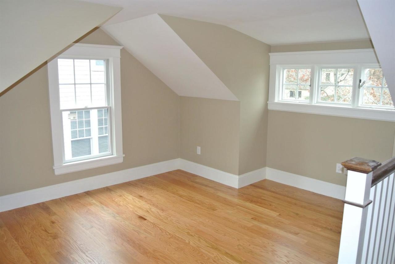 114 Summersea Road, Unit 90 Mashpee, MA 02649 - Photo 12 of 24 an empty room with wooden floor and windows