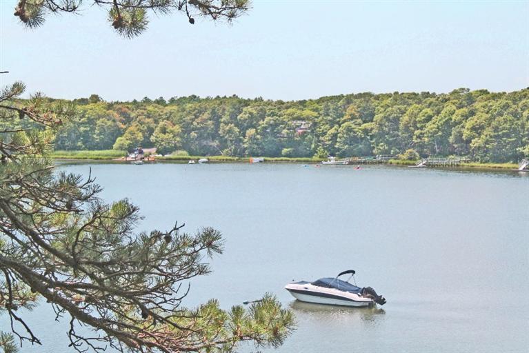 114 Summersea Road, Unit 90 Mashpee, MA 02649 - Photo 20 of 24 an aerial view of a house with a lake view