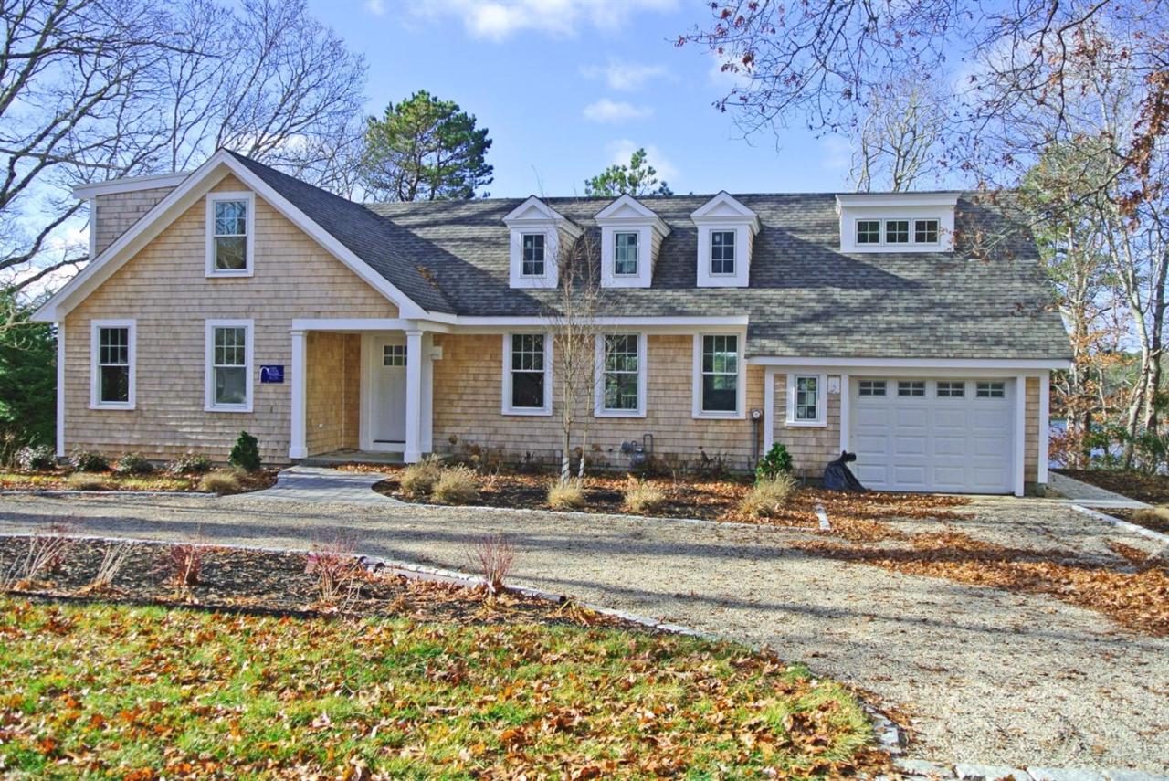 114 Summersea Road, Unit 90 Mashpee, MA 02649 - Photo 2 of 24 a front view of house with yard