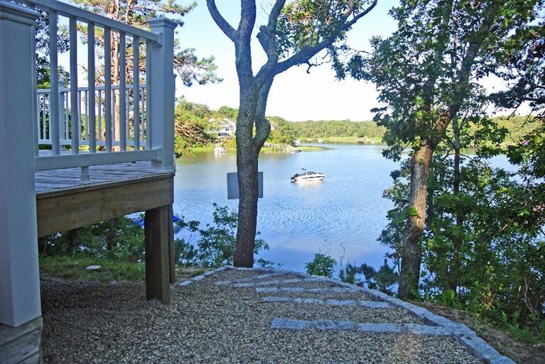 114 Summersea Road, Unit 90 Mashpee, MA 02649 - Photo 21 of 24 a view of a garden with a lake view