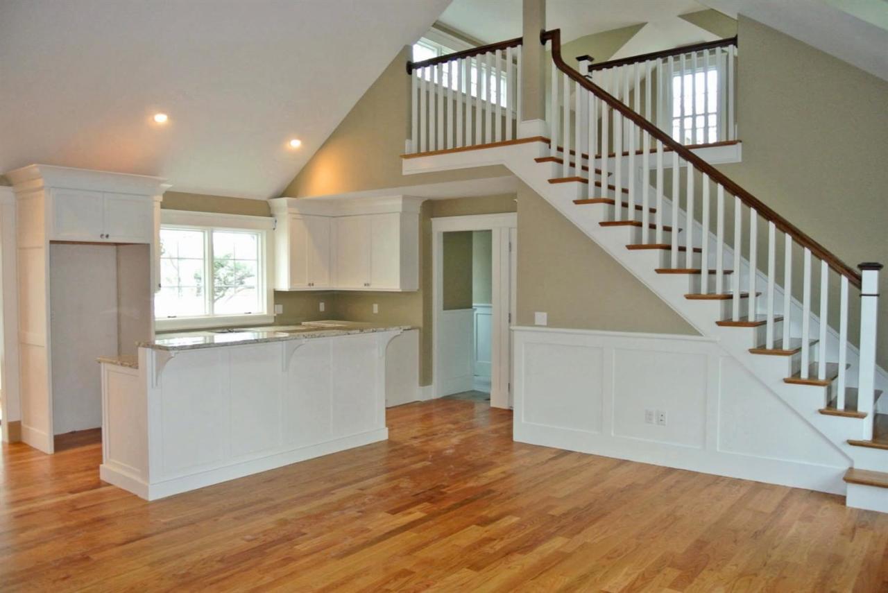 114 Summersea Road, Unit 90 Mashpee, MA 02649 - Photo 5 of 24 a view of entryway and kitchen with wooden floor
