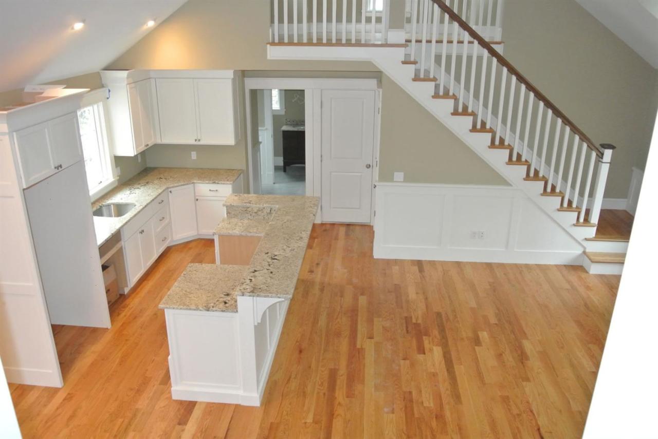 114 Summersea Road, Unit 90 Mashpee, MA 02649 - Photo 6 of 24 a view of a kitchen cabinets and wooden floor