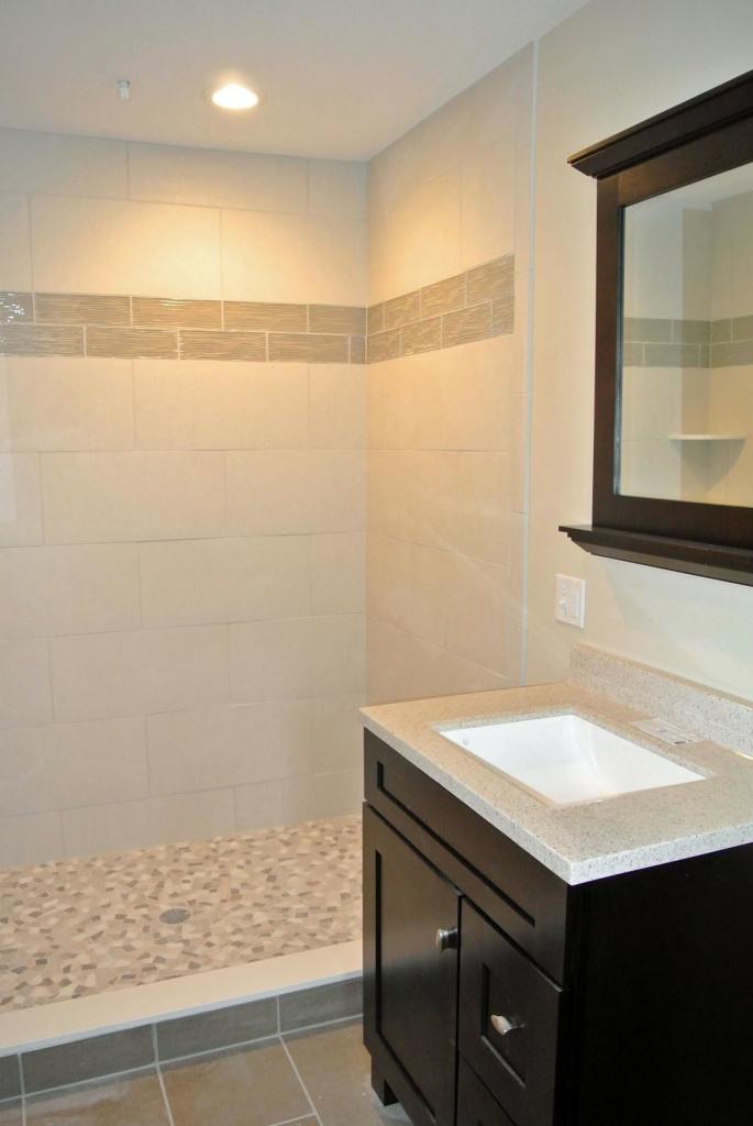 114 Summersea Road, Unit 90 Mashpee, MA 02649 - Photo 10 of 24 a bathroom with a sink and a mirror