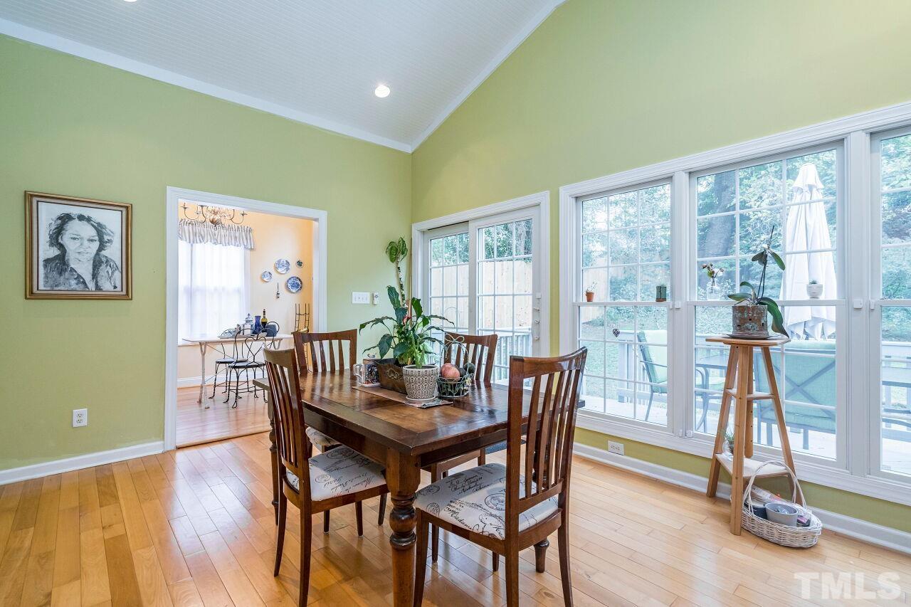 2521 Kilgore Avenue Raleigh, NC 27607 - Photo 14 of 30 a view of a dining room with furniture and a large window