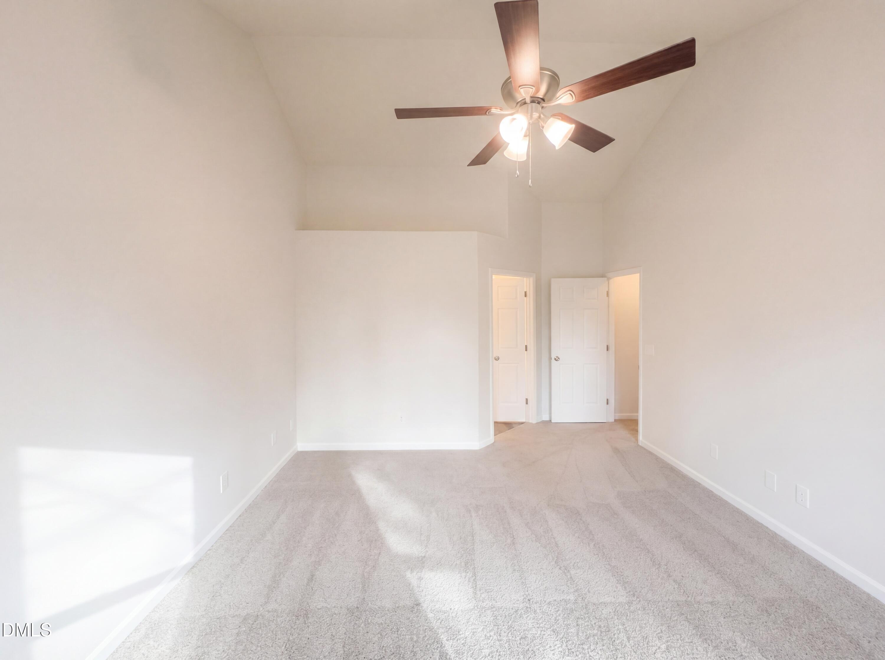 8988 Stamford Club Court Rural Hall, NC 27045 - Photo 15 of 22 a view of a room with a ceiling fan and a window