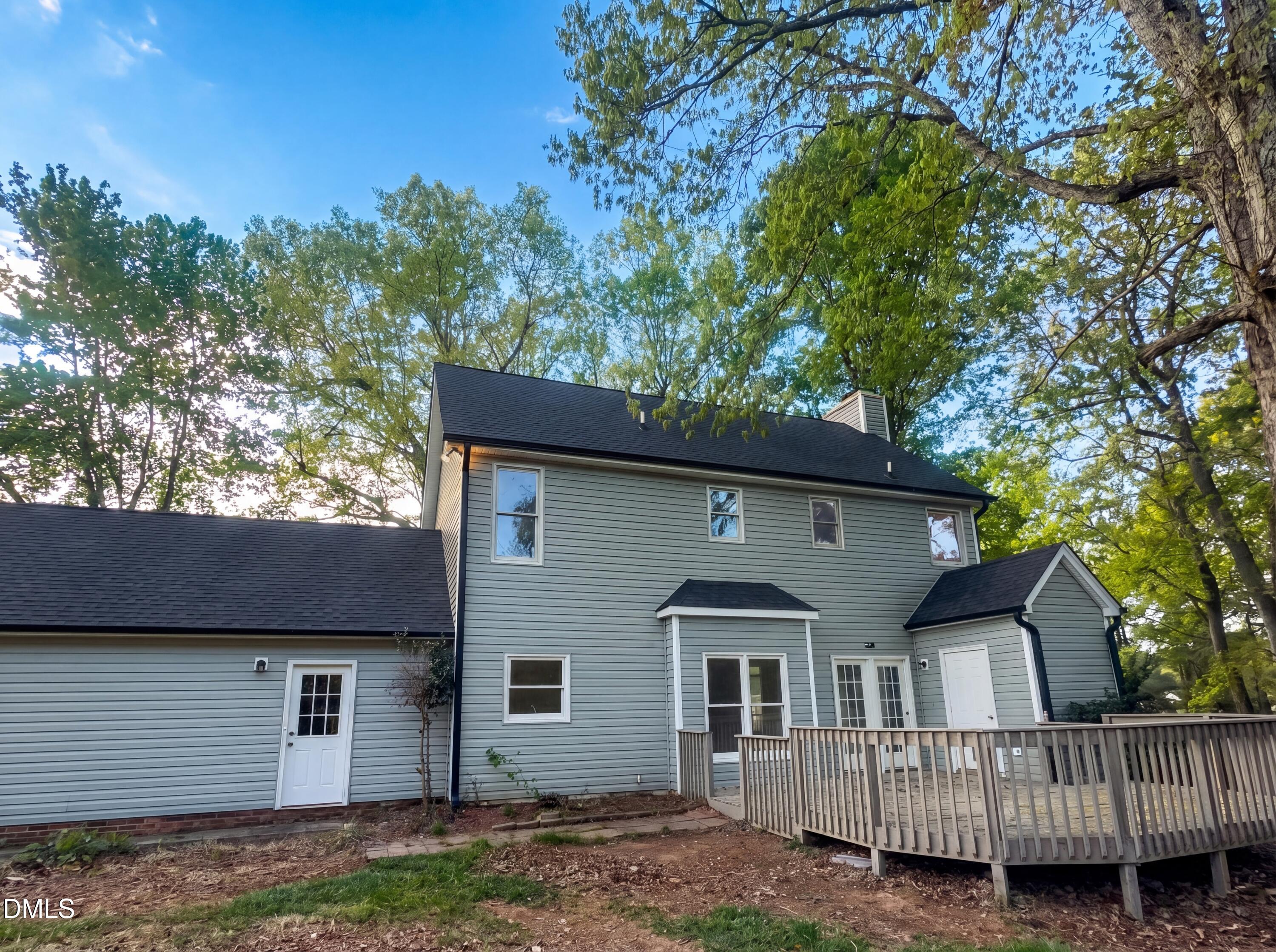 8988 Stamford Club Court Rural Hall, NC 27045 - Photo 21 of 22 a view of a house with a yard