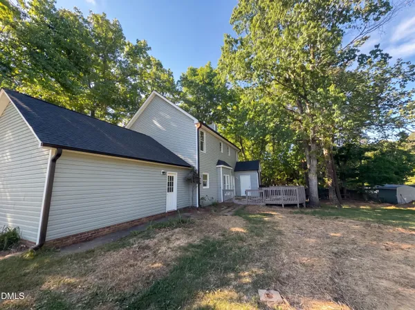 a house view with a backyard space