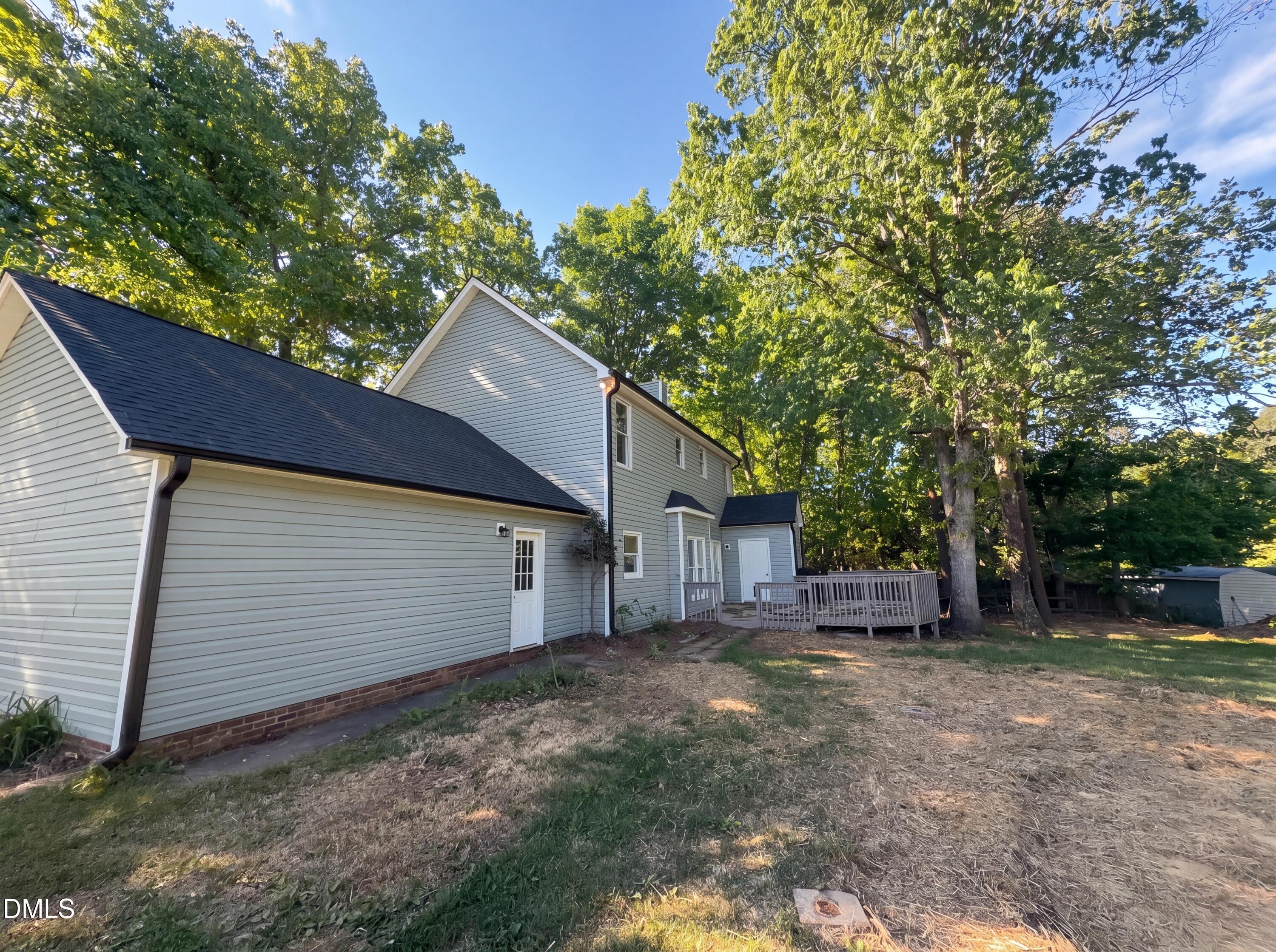8988 Stamford Club Court Rural Hall, NC 27045 - Photo 22 of 22 a house view with a backyard space