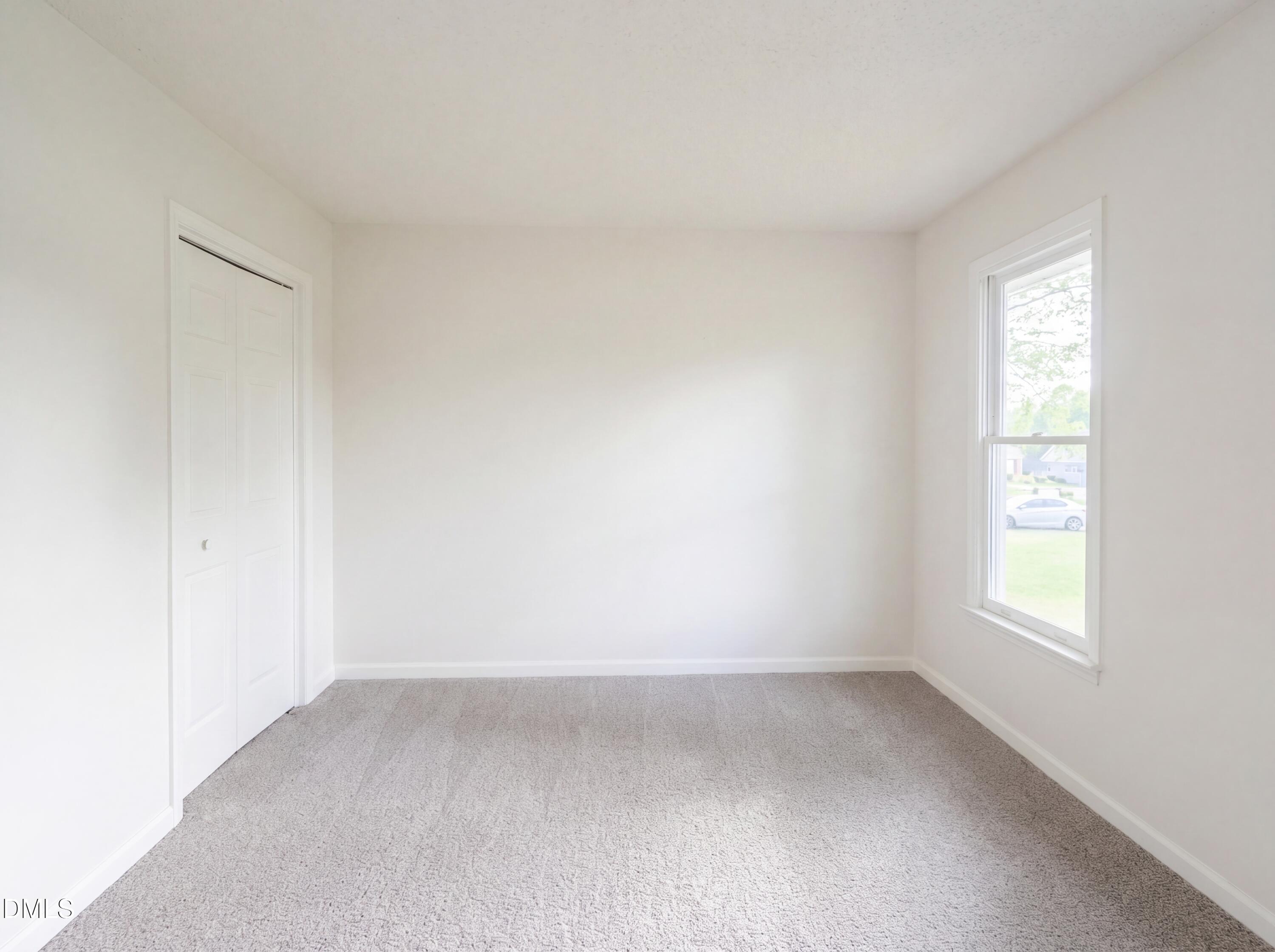 8988 Stamford Club Court Rural Hall, NC 27045 - Photo 10 of 22 an empty room with a window