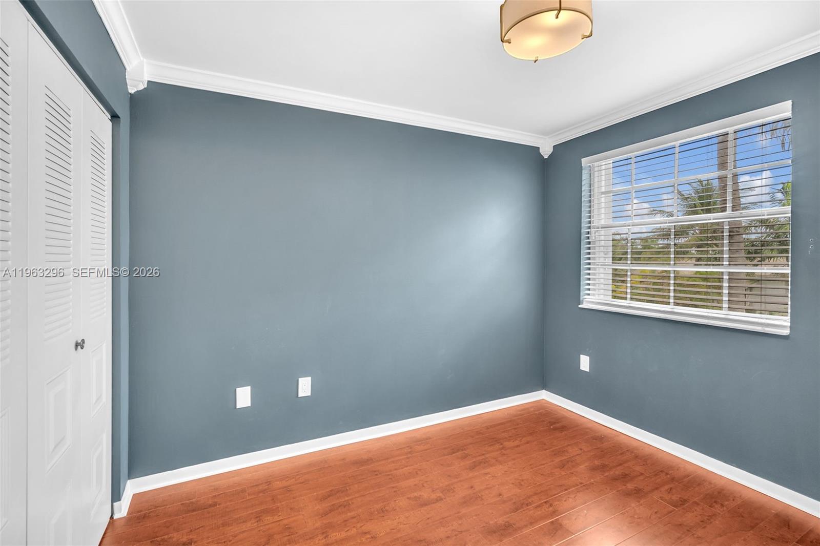 11864 Southwest 97th Terrace Miami, FL 33186 - Photo 21 of 32 a view of an empty room with a window