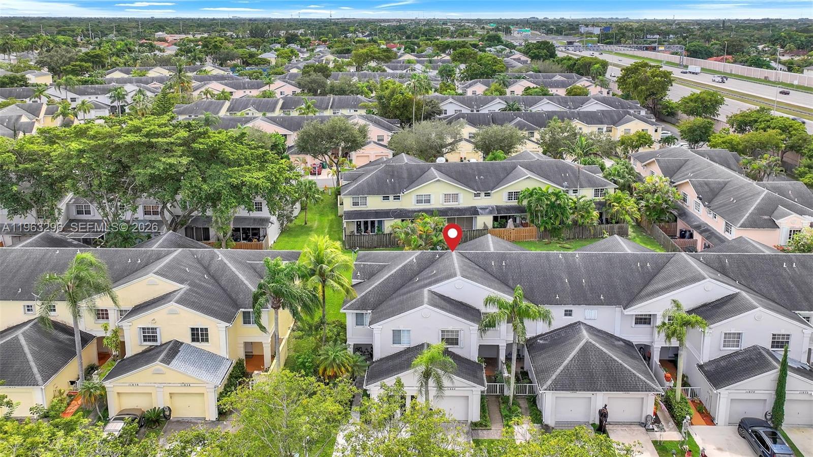 11864 Southwest 97th Terrace Miami, FL 33186 - Photo 27 of 32 an aerial view of residential houses with outdoor space and parking
