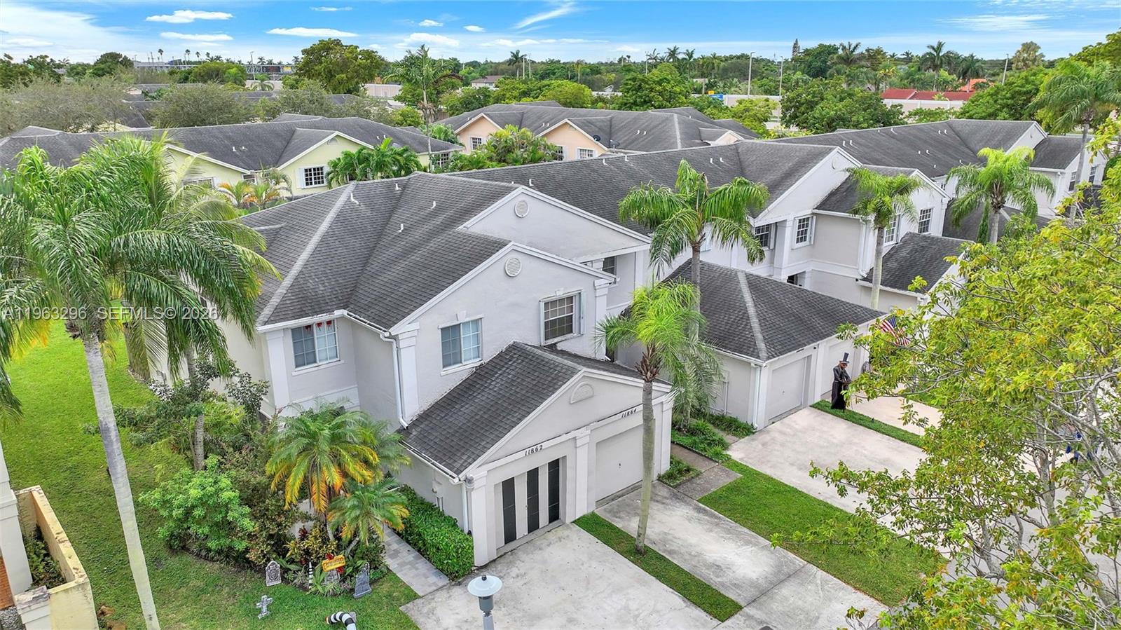 11864 Southwest 97th Terrace Miami, FL 33186 - Photo 28 of 32 a aerial view of a house with a garden