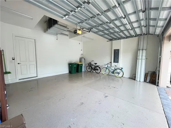 a view of hallway with furniture