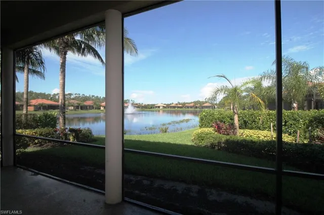 a view of a glass door and the balcony