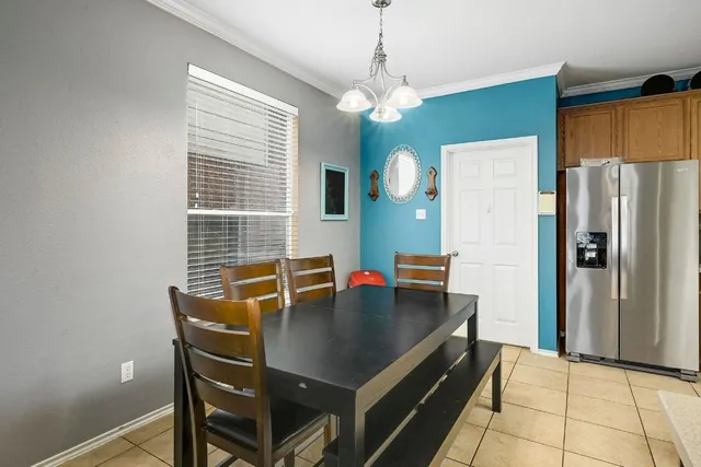 a view of kitchen and dining room with wooden floor