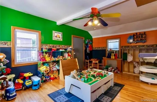 a living room filled with furniture and a rug