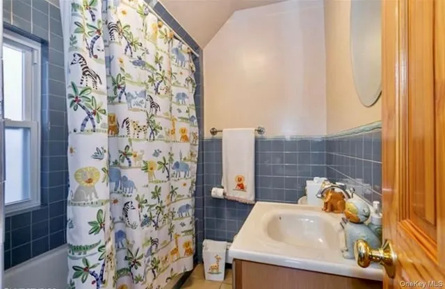 a bathroom with a sink and a tub