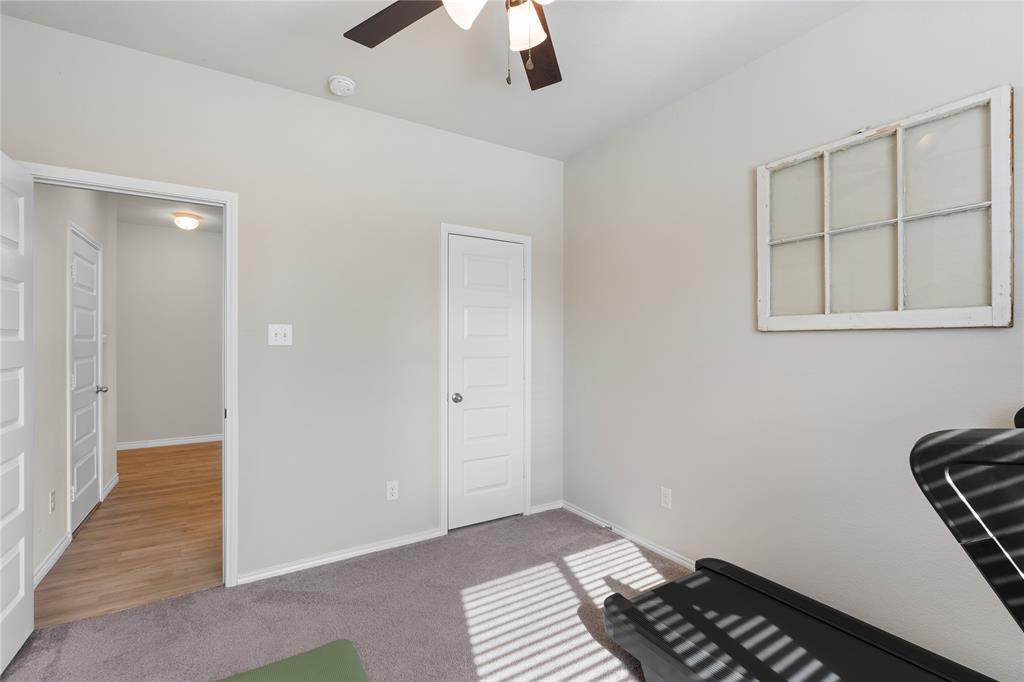 1061 Stanridge Lane Van Alstyne, TX 75495 - Photo 11 of 37 wooden floor in an empty room