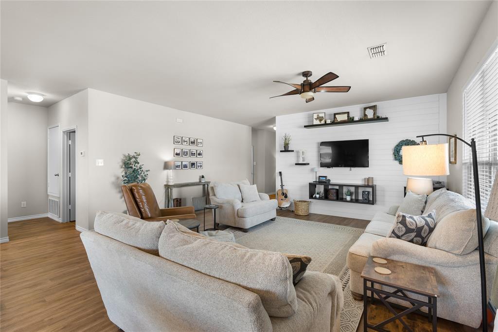 1061 Stanridge Lane Van Alstyne, TX 75495 - Photo 14 of 37 a living room with furniture and white walls