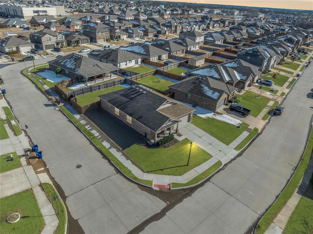 1061 Stanridge Lane Van Alstyne, TX 75495 - Photo 31 of 37 an aerial view of residential houses with outdoor space