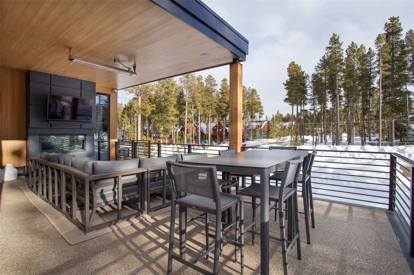 3764 Ski Hill Road Breckenridge, CO 80424 - Photo 12 of 30 a view of a patio with a table and chairs