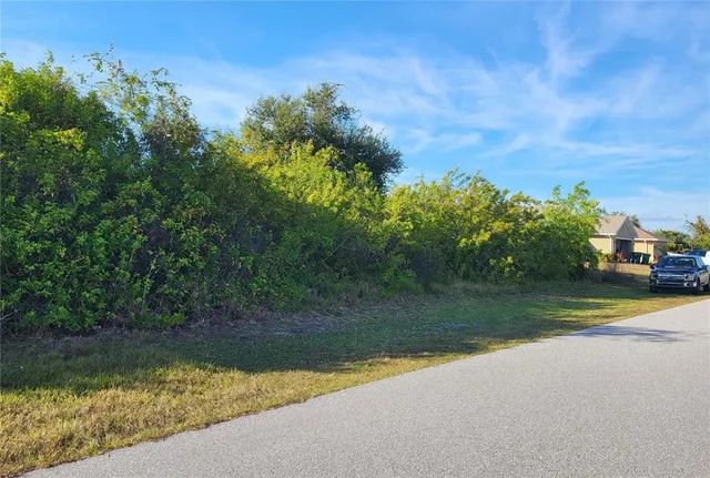a view of swimming pool from a yard