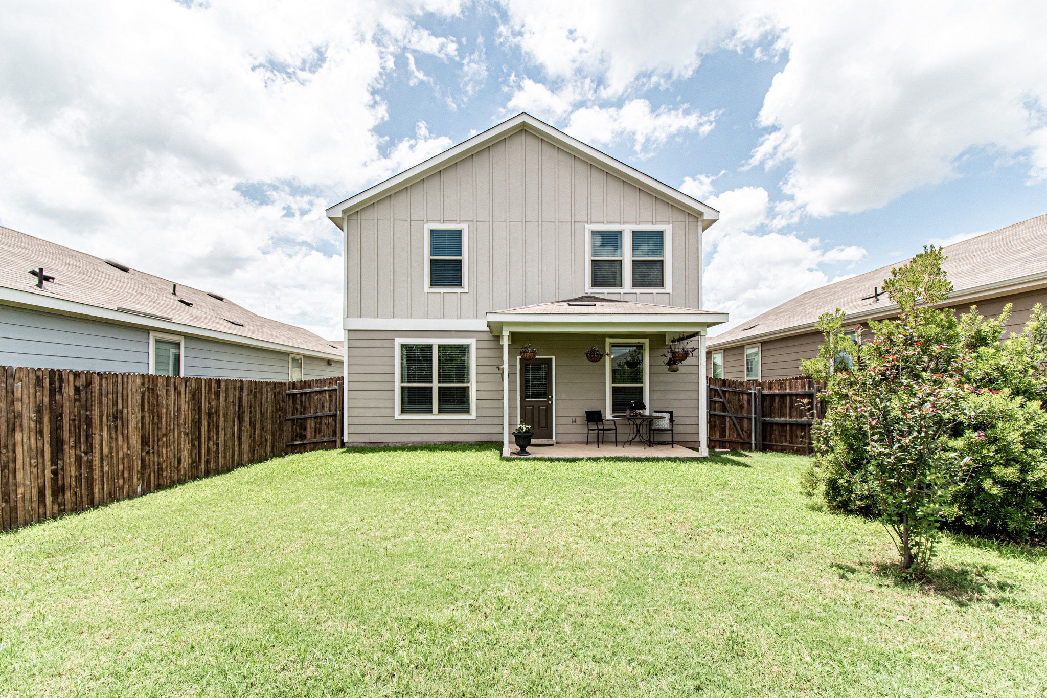 192 Spotted Rail Ridge Leander, TX 78641 - Photo 23 of 34 a view of a house with a yard and sitting area
