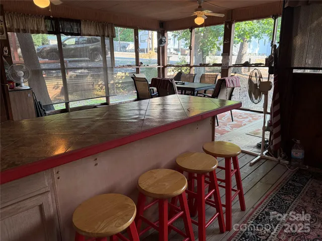 a bedroom with two beds and a table