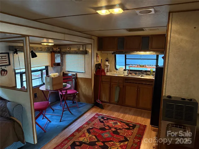 a kitchen with a stove and a microwave