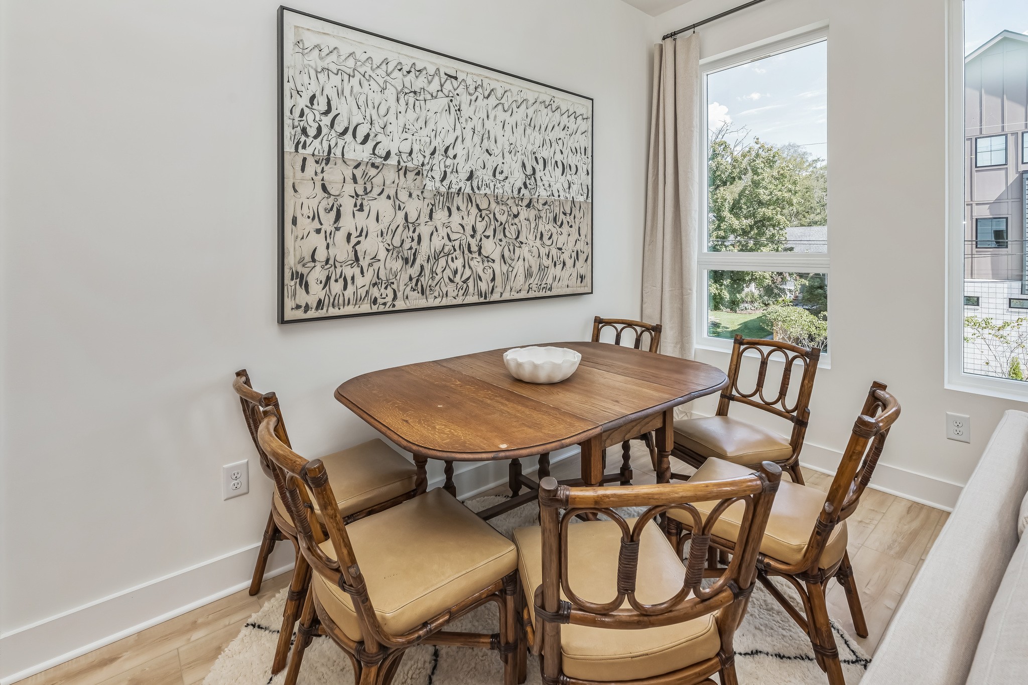 1310 Lischey Avenue, Unit 201 Nashville, TN 37207 - Photo 10 of 36 a view of a dining room with furniture and wooden floor