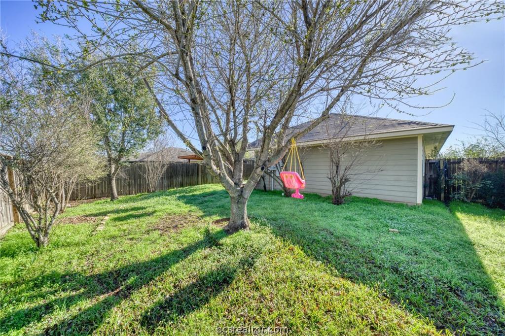 1015 Fallbrook Loop College Station, TX 77845 - Photo 15 of 15 View of yard featuring a fenced backyard