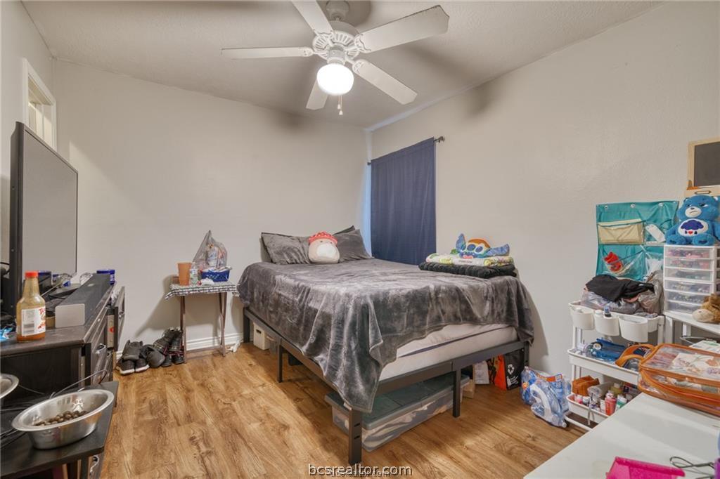 1015 Fallbrook Loop College Station, TX 77845 - Photo 10 of 15 Bedroom with light wood finished floors and a ceiling fan