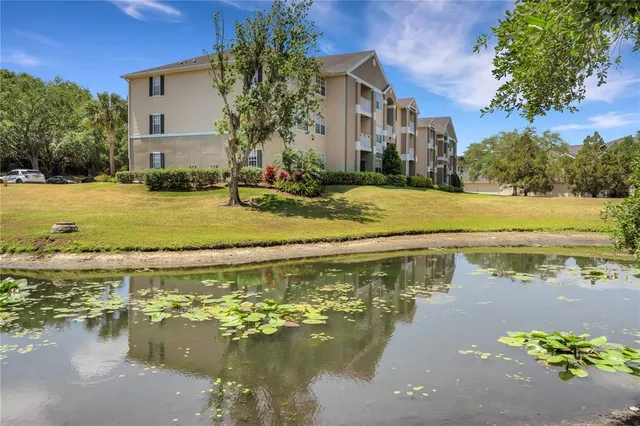 a view of a lake with a house