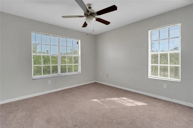 a view of a balcony with wooden floor