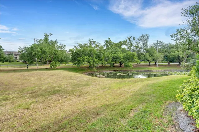 a view of a lake with a big yard