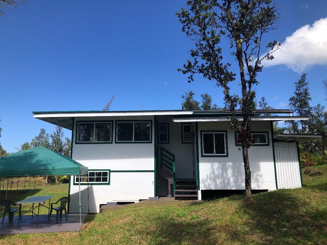 16-1568 38th Avenue Keaau, HI 96749 - Photo 14 of 30 a view of a house with backyard and sitting area