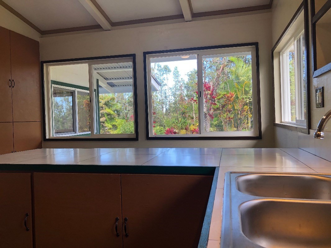 16-1568 38th Avenue Keaau, HI 96749 - Photo 3 of 30 a kitchen with a large window