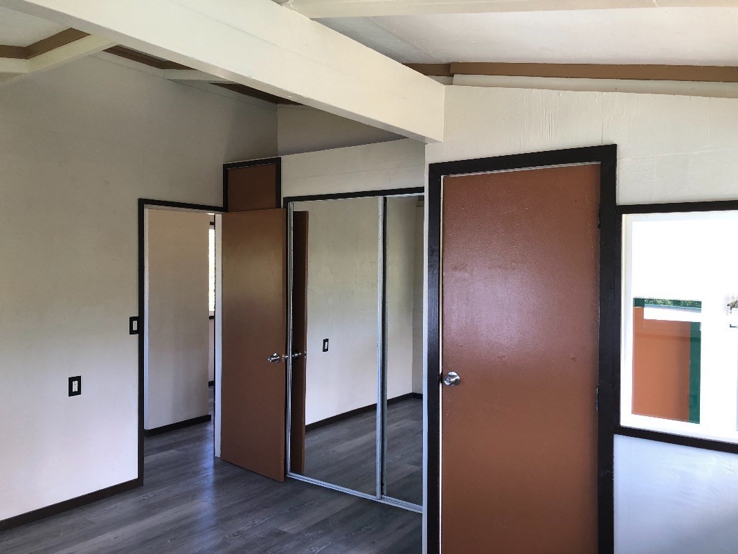 16-1568 38th Avenue Keaau, HI 96749 - Photo 7 of 30 a view of front door with wooden floor